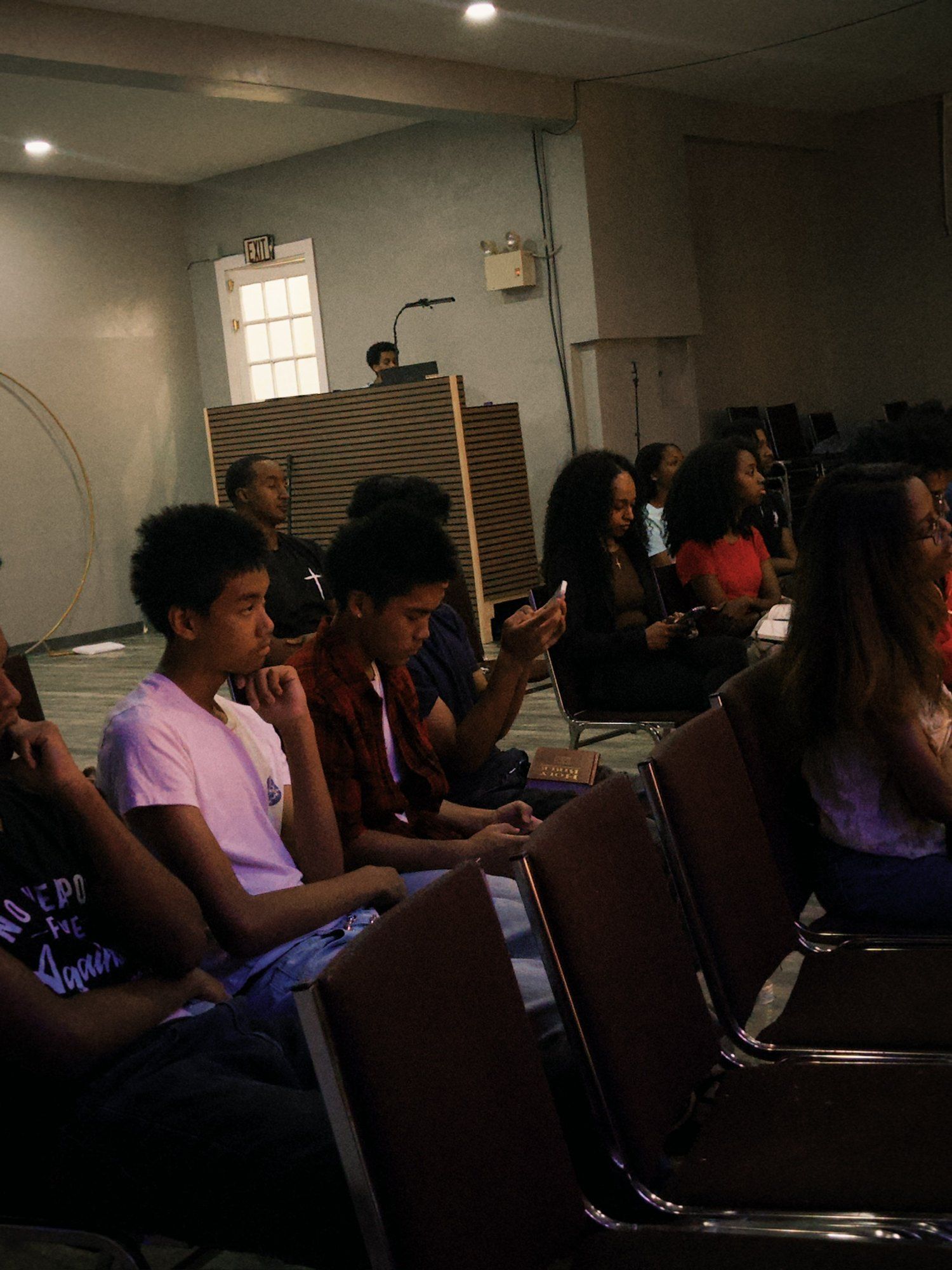 The congregation listening to the sermon