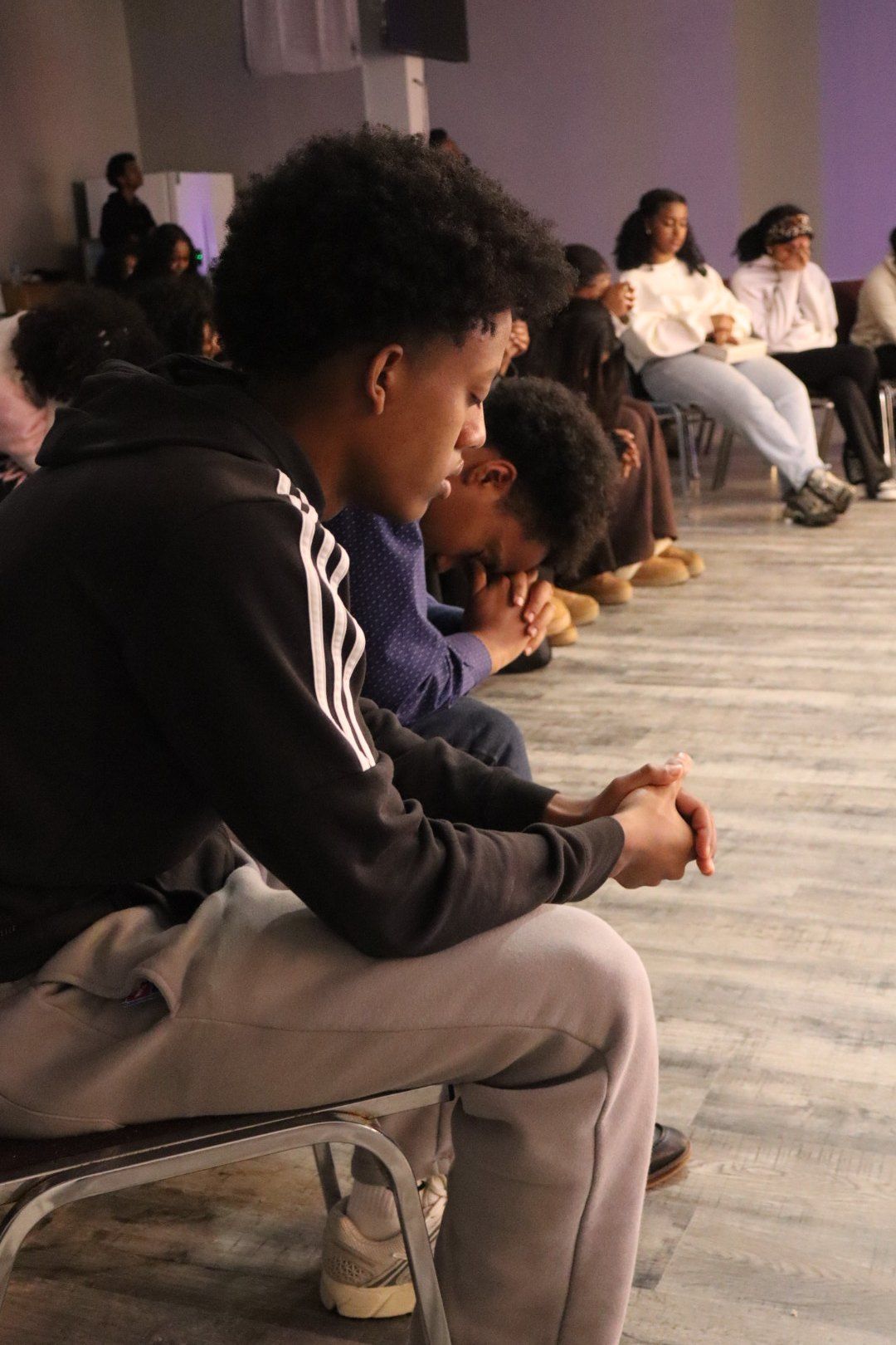 A young man in prayer
